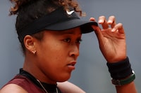 MADRID, SPAIN - APRIL 25: Naomi Osaka of Japan looks on against Liudmila Samsonova on Day Two during their 2nd Round match of the Mutua Madrid Open at La Caja Magica on April 25, 2024 in Madrid, Spain. (Photo by Clive Brunskill/Getty Images)