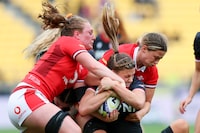 WELLINGTON, NEW ZEALAND - OCTOBER 21: Sophie de Goede of Canada is tackled during the WXV1 match between Canada and Wales at Sky Stadium on October 21, 2023 in Wellington, New Zealand. (Photo by Hagen Hopkins/Getty Images)