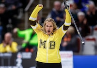Team Manitoba-Jones skip Jennifer Jones reacts to her  shot as she plays Team Alberta in qualifications at the Scotties Tournament of Hearts in Calgary, Alta., Friday, Feb. 23, 2024.  THE CANADIAN PRESS/Jeff McIntosh