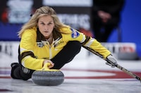 Team Manitoba-Jones skip Jennifer Jones makes a shot against Team Ontario-Homan in the final at the Scotties Tournament of Hearts in Calgary, Sunday, Feb. 25, 2024. Jones's final tournament as part of a four-player team got off to a rocky start with a six-end 9-2 loss to Sweden's Isabella Wrana on Tuesday at the Grand Slam of Curling's season-ending Players' Championship.THE CANADIAN PRESS/Jeff McIntosh