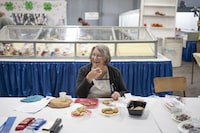 Baked Goods judge Jane McGill laughs while judging the Chocolate Chip Cookies category at the 258th Hants County Exhibition in Windsor, N.S. on Friday, September 15, 2023. First established in 1765, the Hants County Exhibition is billed as the oldest continuously run agricultural fair in North America.

Darren Calabrese/The Globe and Mail