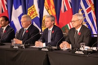 Tim Houston, centre, Premier of Nova Scotia and host, speaks during a press conference at the meeting of the Council of the Federation, where Canada's provincial and territorial leaders meet, in Halifax, Monday, Nov. 6, 2023. THE CANADIAN PRESS/Kelly Clark