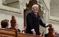 Former prime minister Brian Mulroney stands during question period in the House of Commons on Parliament Hill, in Ottawa on Monday, Nov. 6, 2017.