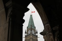 The Canadian flag flies at half-mast on the Peace Tower in memory of the victims of the mosque attacks in New Zealand, on Parliament Hill in Ottawa, Ontario, Canada, March 15, 2019. REUTERS/Chris Wattie