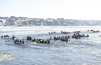 <div>Mild weather has for Carnaval de Québec to close one of its signature venues on the last day of the 18-day event. Some of the 50 teams take the start of the Quebec Winter Carnival ice canoe race across the St-Lawrence River in Quebec City, Sunday, Feb. 4, 2024. THE CANADIAN PRESS/Karoline Boucher</div>