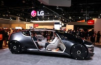FILE PHOTO: Attendees try out an Alpha-able future mobility concept in the LG booth at CES 2024, an annual consumer electronics trade show, in Las Vegas, Nevada, U.S. January 9, 2024. REUTERS/Steve Marcus/File Photo