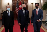 Canadian Prime Minister Justin Trudeau walks with United States President Joe Biden and  Mexican President Andres Manuel Lopez Obrador to a meeting at the North American Leaders' Summit in Washington, D.C., on November 18, 2021. Familiar North American irritants -- U.S. protectionism, intransigence on continental trade, irregular migration -- return to the fore this week as the so-called "Three Amigos" meet for a trilateral summit in Mexico City. THE CANADIAN PRESS/Adrian Wyld