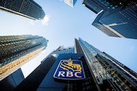FILE PHOTO: A Royal Bank of Canada (RBC) logo is seen on Bay Street in the heart of the financial district in Toronto, January 22, 2015. REUTERS/Mark Blinch/File Photo