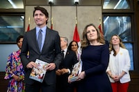 Prime Minister Justin Trudeau, Deputy Prime Minister, Minister of Finance Chrystia Freeland and cabinet ministers pose for a photo before the tabling of the federal budget on Parliament Hill in Ottawa, on Tuesday, April 16, 2024. THE CANADIAN PRESS/Justin Tang