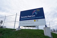 A sign for Toronto Pearson International Airport is pictured in Mississauga, Ont., on Thursday, April 20, 2023. Toronto's Pearson Airport will be home to Ontario's first public hydrogen refuelling station. THE CANADIAN PRESS/Arlyn McAdorey