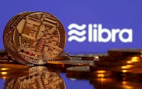 Representations of virtual currency are displayed in front of the Libra logo in this illustration picture, June 21, 2019.