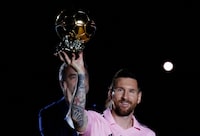 FILE PHOTO: Soccer Football - Club Friendly - Inter Miami v New York City Football Club - DRV PNK Stadium, Fort Lauderdale, Florida, United States - November 10, 2023   Lionel Messi poses with his eighth Ballon d'Or during the Noche d'Or ceremony ahead of the match REUTERS/Marco Bello/File Photo