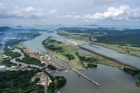 An aerial view of Panama Canal, in Panama city, on Sept. 12, 2023. The number of ships that can travel through the vital route has fallen sharply this year because of a lack of water for the locks, raising costs and slowing deliveries. (Nathalia Angarita/The New York Times)