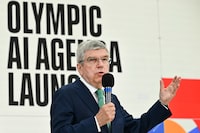 IOC President, Thomas Bach delivers the closing speech during the Olympic AI Agenda event at Lee Valley VeloPark in east London on April 19, 2024. The Olympic AI Agenda is the third in a trilogy of strategy documents launched under Thomas Bach's presidency, and presents the envisioned impact that artificial intelligence can deliver for sport. (Photo by Ben Stansall / AFP) (Photo by BEN STANSALL/AFP via Getty Images)