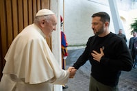 This photo taken and issued as a handout on May 13, 2023 by the Vatican Media shows Pope Francis greeting Ukrainian President Volodymyr Zelensky upon his arrival for a private audience in The Vatican. Ukrainian President Volodymyr Zelensky arrived in Rome on May 13 for meetings with President of Italy Sergio Mattarella, Prime Minister Giorgia Meloni and Pope Francis in his first visit to Italy since Russia's invasion. (Photo by Handout / VATICAN MEDIA / AFP) / RESTRICTED TO EDITORIAL USE - MANDATORY CREDIT "AFP PHOTO / VATICAN MEDIA" - NO MARKETING NO ADVERTISING CAMPAIGNS - DISTRIBUTED AS A SERVICE TO CLIENTS (Photo by HANDOUT/VATICAN MEDIA/AFP via Getty Images)