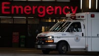A ambulance drives past the emergency entrance of Vancouver General Hospital in Vancouver, B.C., Friday, April 9, 2021. COVID-19 cases have been on a steady increase in the province of British Columbia over the past week. THE CANADIAN PRESS/Jonathan Hayward