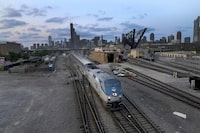 An Amtrak passenger train departs Chicago on Wednesday, Sept. 14, 2022, in Chicago. Amtrak is making a sales pitch to connect its lines in Detroit to Via Rail tracks across the border, hoping to lay the ground for passenger service between Toronto and Chicago.THE CANADIAN PRESS/AP/Charles Rex Arbogast