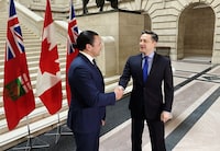 Conservative Leader Pierre Poilievre, right, shakes hands with Manitoba Premier Wab Kinew prior to a meeting at the legislature in Winnipeg on Thursday, March 28, 2024. THE CANADIAN PRESS/Steve Lambert