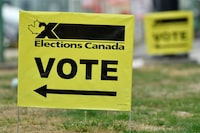 FILE PHOTO: Signs outside of an advance polling station in Burnaby British Columbia, Canada September 10, 2021. REUTERS/Jennifer Gauthier/File Photo