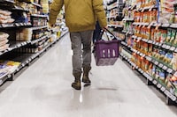 Statistics Canada is set to release its January consumer price index report on Tuesday and forecasters expect Canada's inflation rate fell. A customer browses an aisle at a Metro grocery store In Toronto on Friday, Feb. 2, 2024.  THE CANADIAN PRESS/Cole Burston