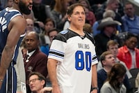 FILE - Dallas Mavericks owner Marc Cuban on the sidelines during the first half of an NBA basketball game against the Los Angeles Lakers in Dallas, Tuesday, Dec. 12, 2023. On Wednesday, Dec. 27, 2023, the NBA approved the sale of controlling interest of the Dallas Mavericks from Mark Cuban to the families that run the Las Vegas Sands casino company. (AP Photo/LM Otero, File)