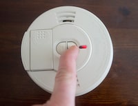 A smoke detector is tested Friday, March 9, 2018 in Montreal. Experts recommend changing the batteries when we switch to daylight savings time to ensure proper functions.THE CANADIAN PRESS/Ryan Remiorz