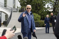 President Joe Biden waves as he walks to Marine One for departure from the South Lawn of the White House, Friday, April 5, 2024, in Washington. Behind the President is Maryland Gov. Wes Moore, center, and Adm. Linda Fagan, right, Commandant of the United States Coast Guard. Biden is headed to Maryland. (AP Photo/Alex Brandon)