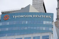 FILE PHOTO: The Thomson Reuters logo is seen on the company building in Times Square, New York, U.S., January 30, 2018. REUTERS/Andrew Kelly/File Photo
