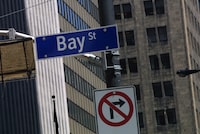 Bay Street sign at the intersection of King Street in downtown Toronto Wednesday afternoon July 30/2003.
Photo By Deborah Baic
30/07/03