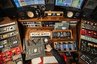 Justin Gray, Dolby Atmos recording engineer works in his Toronto studio, on Tuesday Feb. 6, 2024. (Christopher Katsarov/The Globe and Mail)