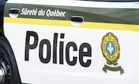 A Sûreté du Québec police car is seen in Montreal on July 22, 2020. Quebec coroner is investigating the death of two Inuuk women in their 20s who were killed in separate Montreal highways accidents over the weekend. THE CANADIAN PRESS/Paul Chiasson