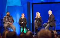 FILE - Michael Oher, left, Collins Tuohy, second from left, and Leigh Anne Tuohy, whose lives are portrayed in the Oscar-nominated movie "The Blind Side," speak with Pastor Kerry Shook, right, March 3, 2010 at Woodlands Church's Fellowship Campus in The Woodlands, TX. Michael Oher, the former NFL tackle known for the movie “The Blind Side,” filed a petition Monday, Aug. 14, 2023, in a Tennessee probate court accusing Sean and Leigh Anne Tuohy of lying to him by having him sign papers making them his conservators rather than his adoptive parents nearly two decades ago. (AP Photo/The Courier, Eric S. Swist, File)