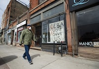 The deadline for Canadian businesses to repay pandemic loans and receive partial forgiveness has arrived, as business groups say it could mean closure for many firms. A closed store front boutique business called Francis Watson pleads for help displaying a sign in Toronto on Thursday, April 16, 2020. THE CANADIAN PRESS/Nathan Denette