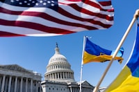 WASHINGTON, DC - APRIL 20: American and Ukrainian flags fly near the U.S. Capitol on April 20, 2024 in Washington, DC. The House is passed a $95 billion foreign aid package today for Ukraine, Israel and Taiwan. (Photo by Nathan Howard/Getty Images)