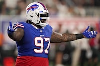 Buffalo Bills defensive tackle Jordan Phillips (97) reacts after a defensive play against the New York Jets during the second quarter of an NFL football game, Monday, Sept. 11, 2023, in East Rutherford, N.J. (AP Photo/Seth Wenig)