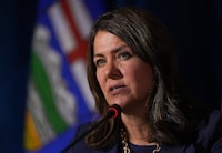 Alberta Premier Danielle Smith responds to a question during a news conference after a meeting of western premiers, in Whistler, B.C., on Tuesday, June 27, 2023. CBC News is retracting a report from January alleging someone in Premier Danielle Smith’s office emailed prosecutors to question the handling of cases involving a COVID-19 protest at a U.S. bordering crossing. THE CANADIAN PRESS/Darryl Dyck