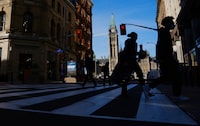 Pedestrians make their way along Sparks Street Mall in Ottawa on in November 2021.