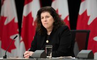 Auditor general Karen Hogan listens to a question from a reporter about her offices report on the ArriveCAN app during a news conference, Monday, February 12, 2024 in Ottawa.