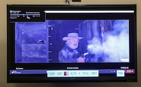 A still from a video clip displayed at the First Judicial District Courthouse shows actor Alec Baldwin, during Rust film set armorer Hannah Gutierrez-Reed's involuntary manslaughter trial at the First Judicial District Courthouse in Santa Fe, New Mexico, U.S., February 29, 2024.    Gabriela Campos/The New Mexican/Pool via REUTERS