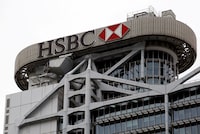 FILE PHOTO: The logo of HSBC is seen on its headquarters in the financial Central district in Hong Kong, China, Aug. 4, 2020. REUTERS/Tyrone Siu/File Photo