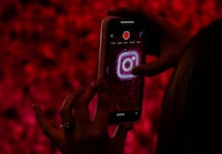 A logo of mobile application Instagram is seen on a mobile phone, during a conference in Mumbai, India, September 20, 2023. REUTERS/Francis Mascarenhas/File photo