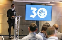 Kick it Out chair Sanjay Bhandari speaks during the Kick It Out 30th anniversary event at Wembley Stadium, in London, Tuesday, Aug. 8, 2023. (Steven Paston/PA via AP)