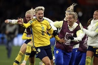Sweden's Lina Hurtig celebrates with teammates at the end of a penalty shootout during the Women's World Cup round of 16 soccer match between Sweden and the United States in Melbourne, Australia, Sunday, Aug. 6, 2023. (AP Photo/Hamish Blair)