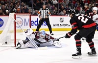 Colorado Avalanche goaltender Justus Annunen (60) makes a save on Ottawa Senators left wing Parker Kelly (27) during second period NHL hockey action in Ottawa, on Tuesday, Jan. 16, 2024. THE CANADIAN PRESS/Justin Tang