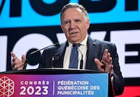 The Quebec government intends to table a bill in the coming days to enable it to join a class action lawsuit brought by British Columbia against more than 40 pharmaceutical companies accused of downplaying the harmful effects of opioids. Quebec Premier Francois Legault speaks to members of the Federation Quebecois des Municipalites at their annual meeting in Quebec City, Friday, Sept. 29, 2023. THE CANADIAN PRESS/Jacques Boissinot
