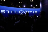 FILE PHOTO: People attend a Stellantis presentation at the New York International Auto Show, in Manhattan, New York City, U.S., April 5, 2023. REUTERS/David 'Dee' Delgado/File Photo