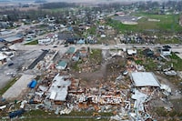 Debris scatters the ground following a severe storm Friday, March 15, 2024, in Lakeview, Ohio. (AP Photo/Joshua A. Bickel)