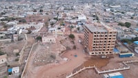 SOUSSAH, LIBYA - SEPTEMBER 14: General view of the city of Soussah following floods on September 14, 2023 in Soussah, Libya. Heavy rains brought by Storm Daniel caused two dams to burst and wiped out entire neighbourhoods in eastern Libya along the country's Mediterranean coast, with officials placing death tolls in the thousands, whilst man more are unaccounted for. (Photo by Mohamed Shalash/Getty Images)