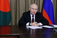 Russian President Vladimir Putin takes part in a video link with officials during a ceremony to mark the arrival of the first shipment of fuel to the Rooppur Nuclear Power Plant, in Sochi, Russia, October 5, 2023. Sputnik/Mikhail Metzel/Pool via REUTERS ATTENTION EDITORS - THIS IMAGE WAS PROVIDED BY A THIRD PARTY.