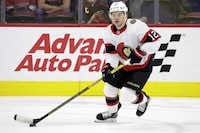 FILE - Ottawa Senators right wing Alex DeBrincat moves the puck during the first period of an NHL hockey game against the Carolina Hurricanes, April 4, 2023, in Raleigh, N.C. The Detroit Red Wings acquired Michigan native DeBrincat from the Ottawa Senators on Sunday, July 9, 2023, in exchange for two players and draft picks. (AP Photo/Chris Seward, File)